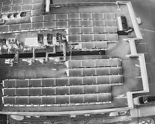 Thermal drone view across a commercial solar array